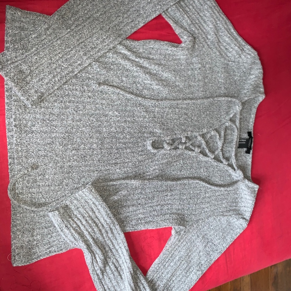 Long sleeve shirt with an open chest. Grey color.